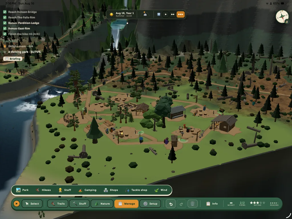 A campsite in a river meadow with fire rings, a shelter, a ranger cabin, benches and tents, reached by a suspension bridge across the river